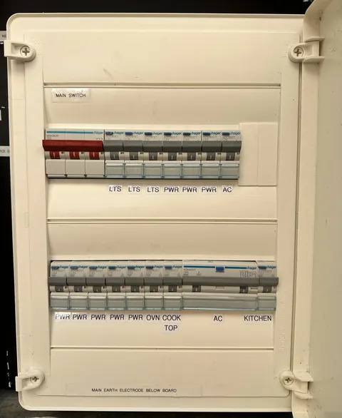 A Hager switchboard with the cover on and every circuit labelled